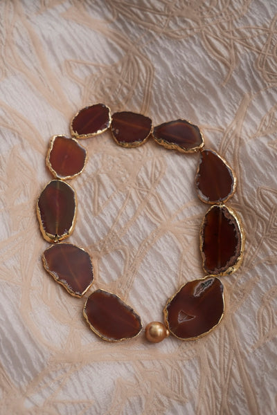 Necklace with orangish-brown agate stones with golden baroque South Sea Pearl